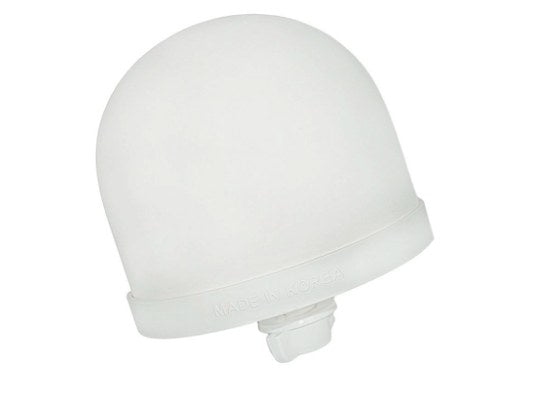 A white ceramic dome water filter element, marked Made in Korea.